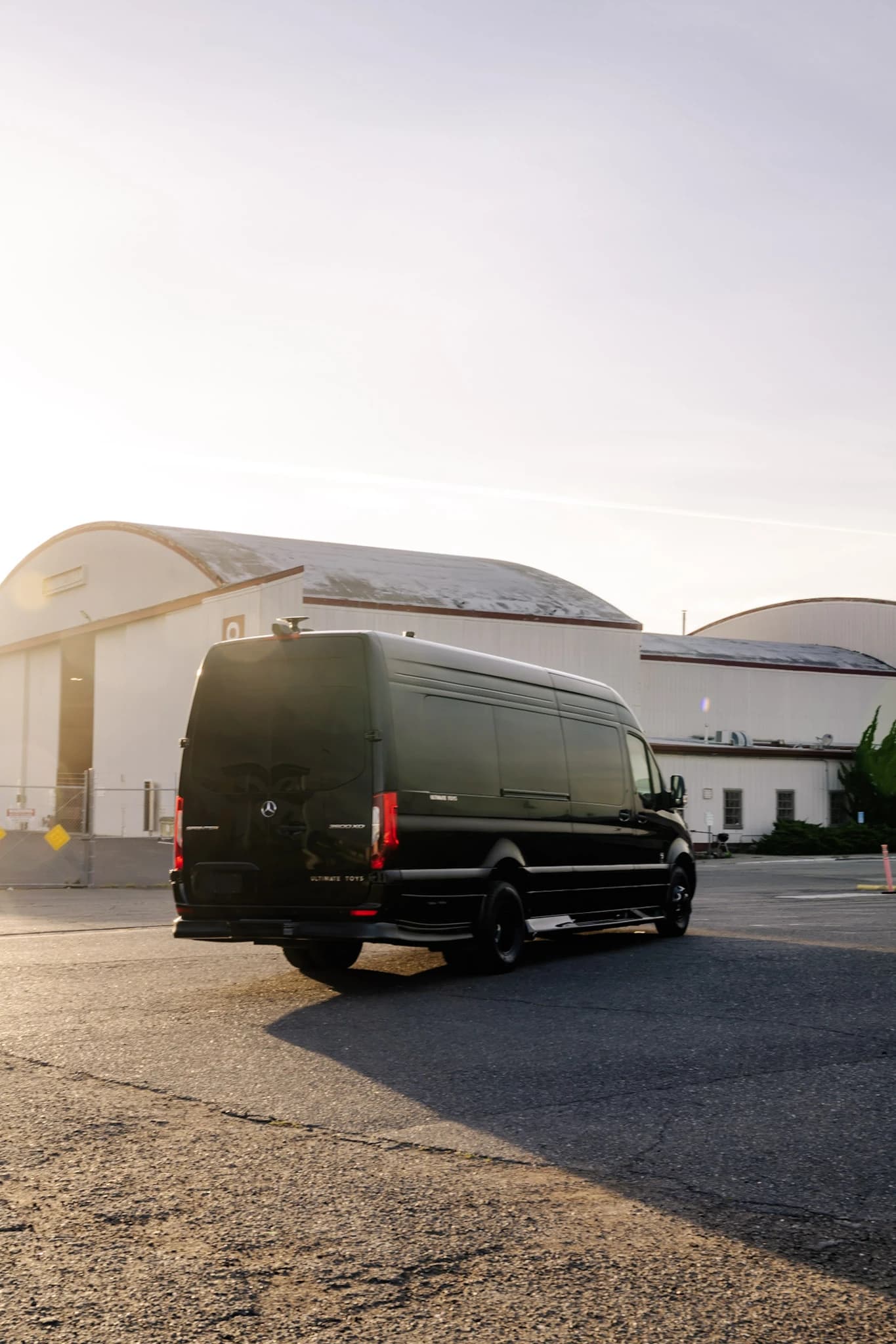 A polished black Sprinter exterior gives every ride a private, professional, and refined arrival experience.